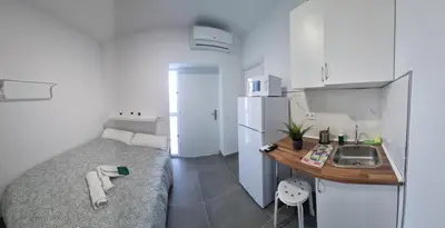 Cama o camas de una habitación en Mini Estudio JACUZZI DOBLE SEVILLA 