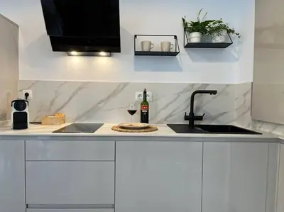 Una cocina o zona de cocina en Atroe Apartment
