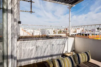 Un balcón o terraza de Beautiful Penthouse with terrace - San Luis - 2Bdr
