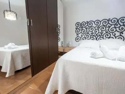 Cama o camas de una habitación en APARTAMENTO AL-ALBA