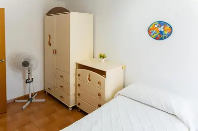 Cama o camas de una habitación en APARTAMENTO AL-ALBA