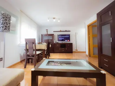 Una televisión o centro de entretenimiento en APARTAMENTO AL-ALBA