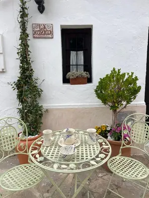 Un patio o zona al aire libre en Acogedora Casa Rural en Olvera La Morada