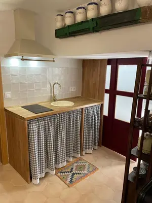 Una cocina o zona de cocina en Apartamento en Casa Patio 