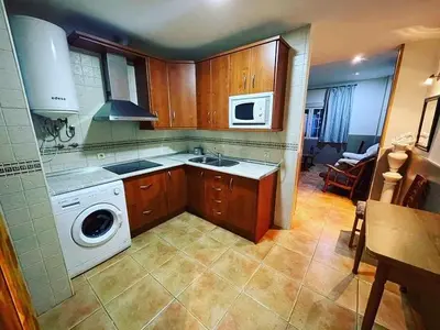 Una cocina o zona de cocina en APARTAMENTOs Colón PONDOS