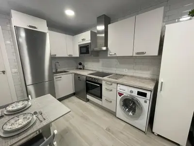 Una cocina o zona de cocina en Apartamento Victoria
