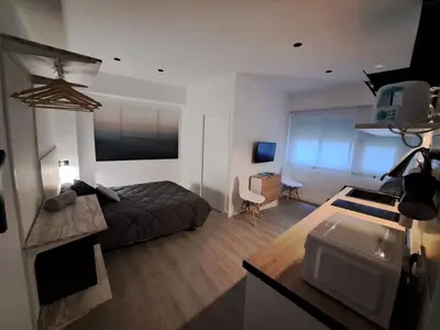 Cama o camas de una habitación en ACC Serrano aparcamiento cercano