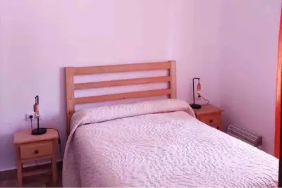 Cama o camas de una habitación en CASA RURAL LOS ALTOS