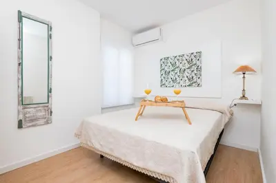 Cama o camas de una habitación en BHost - El Indiano