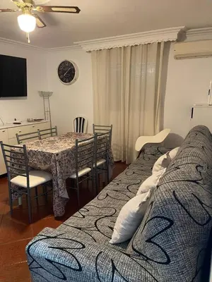 Zona de estar de TrassierraRooms - Casa a 10 min de Córdoba 3 habitaciones