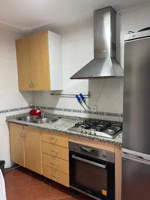 Una cocina o zona de cocina en TrassierraRooms - Casa a 10 min de Córdoba 3 habitaciones