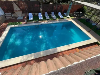 Piscina en o cerca de TrassierraRooms - Casa a 10 min de Córdoba 3 habitaciones