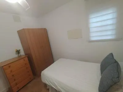 Cama o camas de una habitación en El Madroño de la Encantada