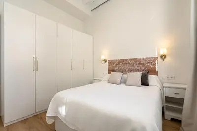 Cama o camas de una habitación en La Joya de Santa Cruz Calle Vírgenes 21