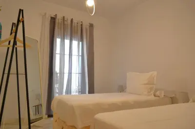 Cama o camas de una habitación en SunShine Patio del Consistorio