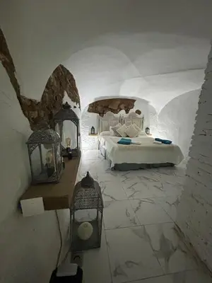 Cama o camas de una habitación en Almodovar alojamientos 1