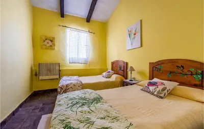 Cama o camas de una habitación en Lovely Home In Cazalla De La Sierra