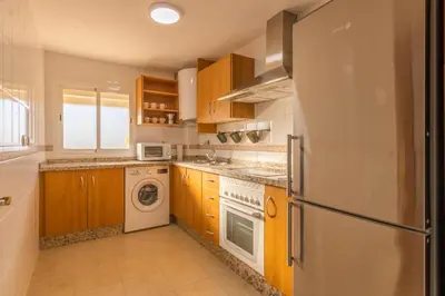 Una cocina o zona de cocina en Apartamento con Terraza San Julian Cordoba