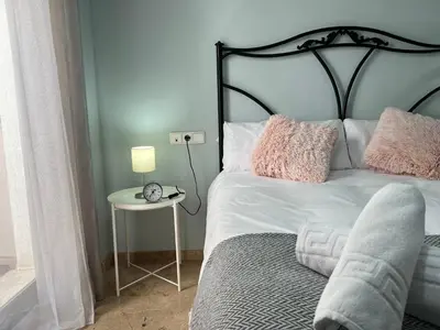 Cama o camas de una habitación en Apartamento La Magdalena