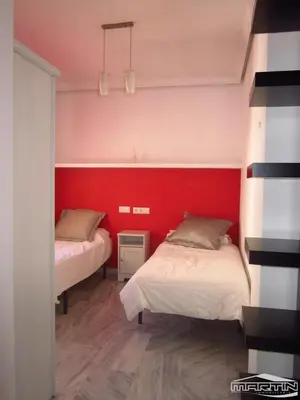 Cama o camas de una habitación en Apartment Quintana Center Parking Gratis