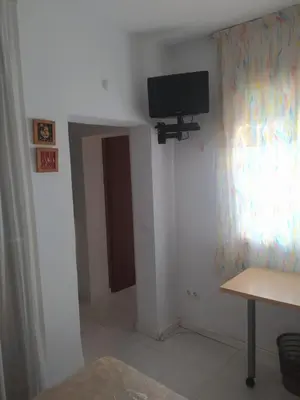 Una televisión o centro de entretenimiento en Ático muy Luminoso en el Casco Antiguo