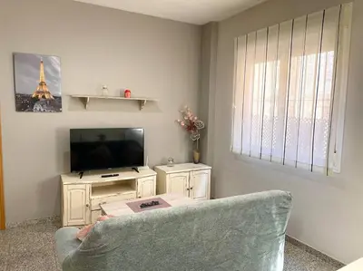Una televisión o centro de entretenimiento en Geysotur El Templo