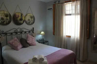 Cama o camas de una habitación en APARTAMENTO LA PICONERA Con piscina a 350 metros