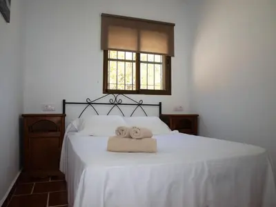 Cama o camas de una habitación en CASA RURAL TRIGUEROS