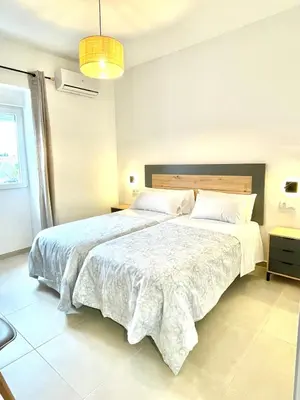 Cama o camas de una habitación en Puente a la Mezquita