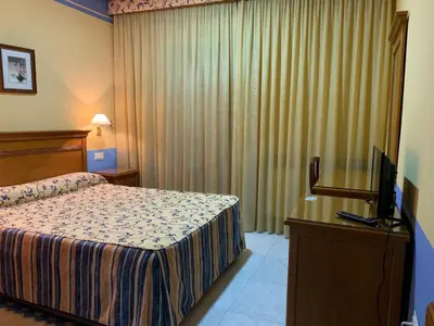 Cama o camas de una habitación en La Sierra