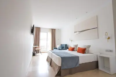 Cama o camas de una habitación en Hotel Oasis