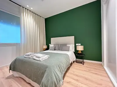 Cama o camas de una habitación en HISPALIS SETAS DE SEVILLA II