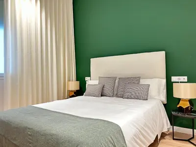 Cama o camas de una habitación en HISPALIS SETAS DE SEVILLA II