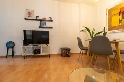 Una televisión o centro de entretenimiento en Apartamento Garcia