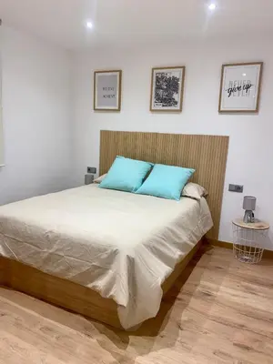 Cama o camas de una habitación en villaboutique Jaén 2