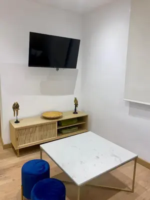 Una televisión o centro de entretenimiento en villaboutique Jaén 2
