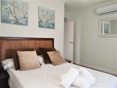 Cama o camas de una habitación en Home Sweet Home junto a Mezquita / Wifi / Parking