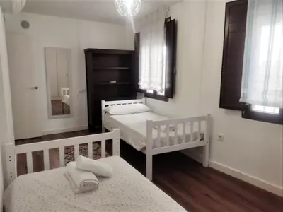 Cama o camas de una habitación en Home Sweet Home junto a Mezquita / Wifi / Parking