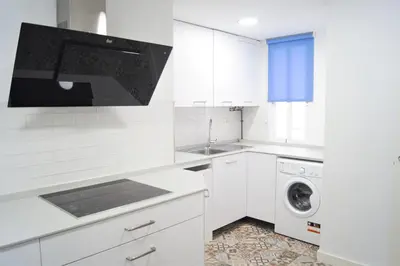 Una cocina o zona de cocina en Home Sweet Home junto a Mezquita / Wifi / Parking