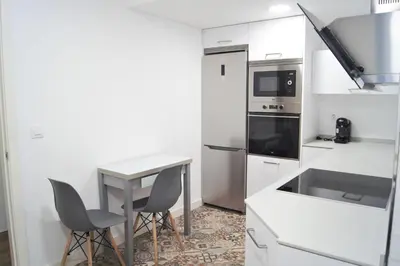 Una cocina o zona de cocina en Home Sweet Home junto a Mezquita / Wifi / Parking