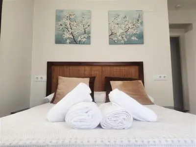 Cama o camas de una habitación en Home Sweet Home junto a Mezquita / Wifi / Parking
