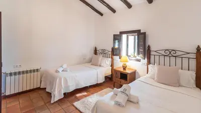 Cama o camas de una habitación en Finca las Chozas Antequera - La Joya by Ruralidays