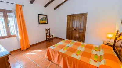 Cama o camas de una habitación en La Carrasca II Priego de Córdoba by Ruralidays