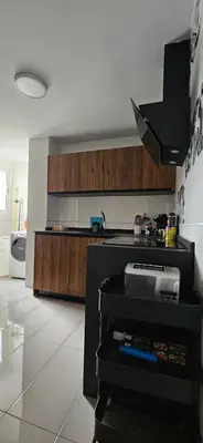 Una cocina o zona de cocina en Piso luminoso y acogedor