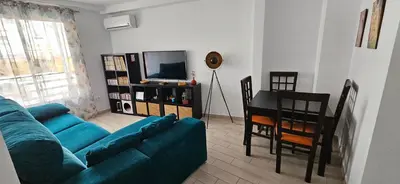 Zona de estar de Piso luminoso y acogedor