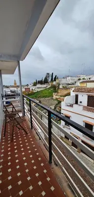 Un balcón o terraza de Piso luminoso y acogedor
