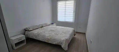 Cama o camas de una habitación en Piso luminoso y acogedor