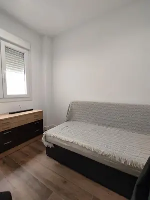 Cama o camas de una habitación en APARTAMENTO ANCHA CENTRO
