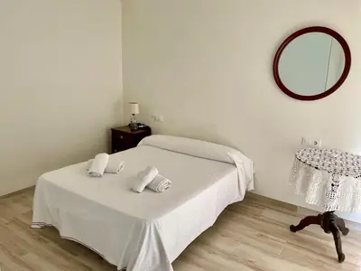 Cama o camas de una habitación en Geysotur Casa de la Abuela Antonia