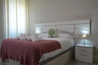 Cama o camas de una habitación en SunShine Capricho de las Tendillas
